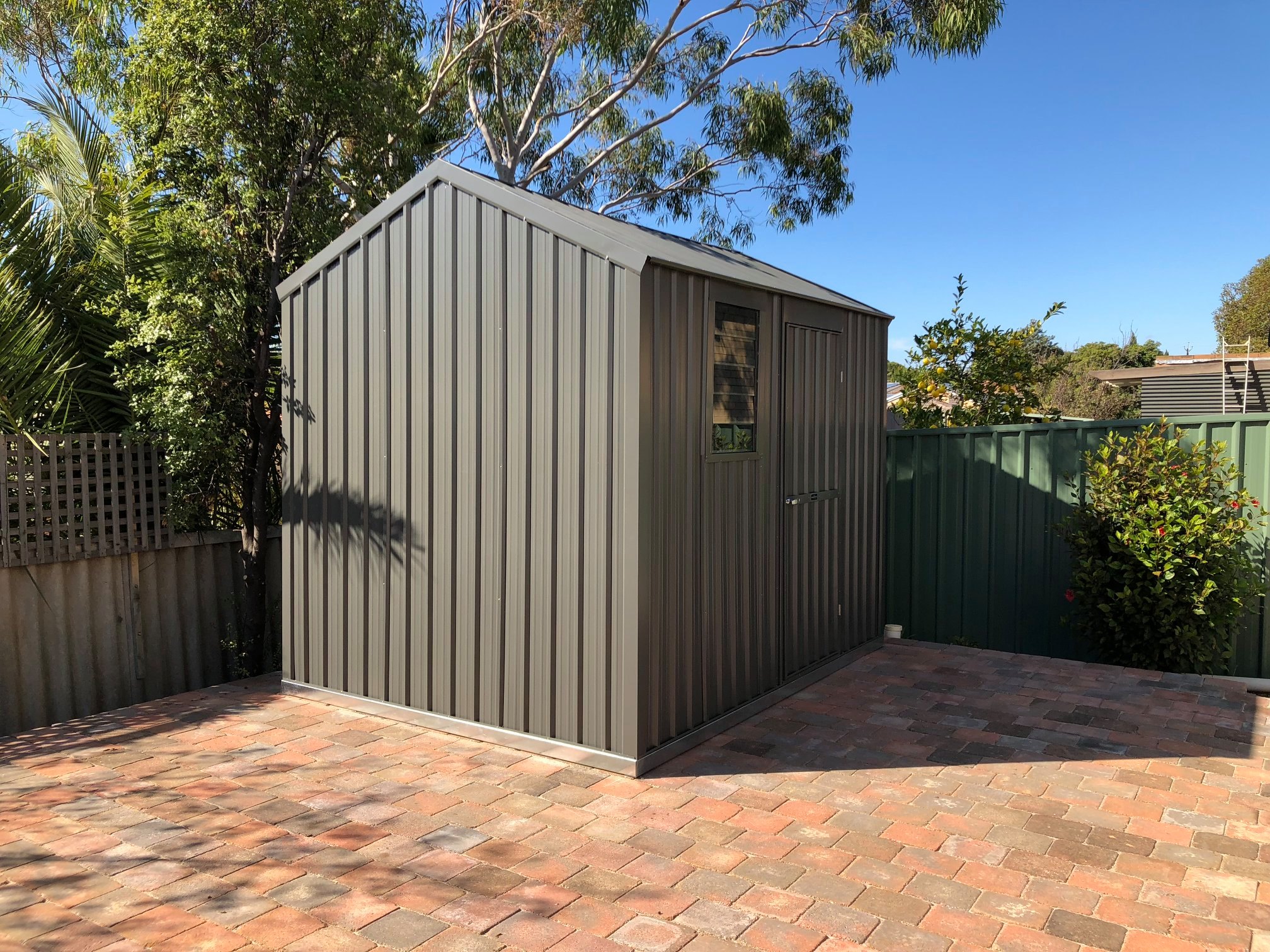 Image of a gray shed in the outdoor